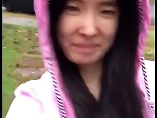 Asian Teen publicly reveals herself in transmitted to rain!