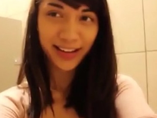 Asian teen Mei masturbates in public restroom